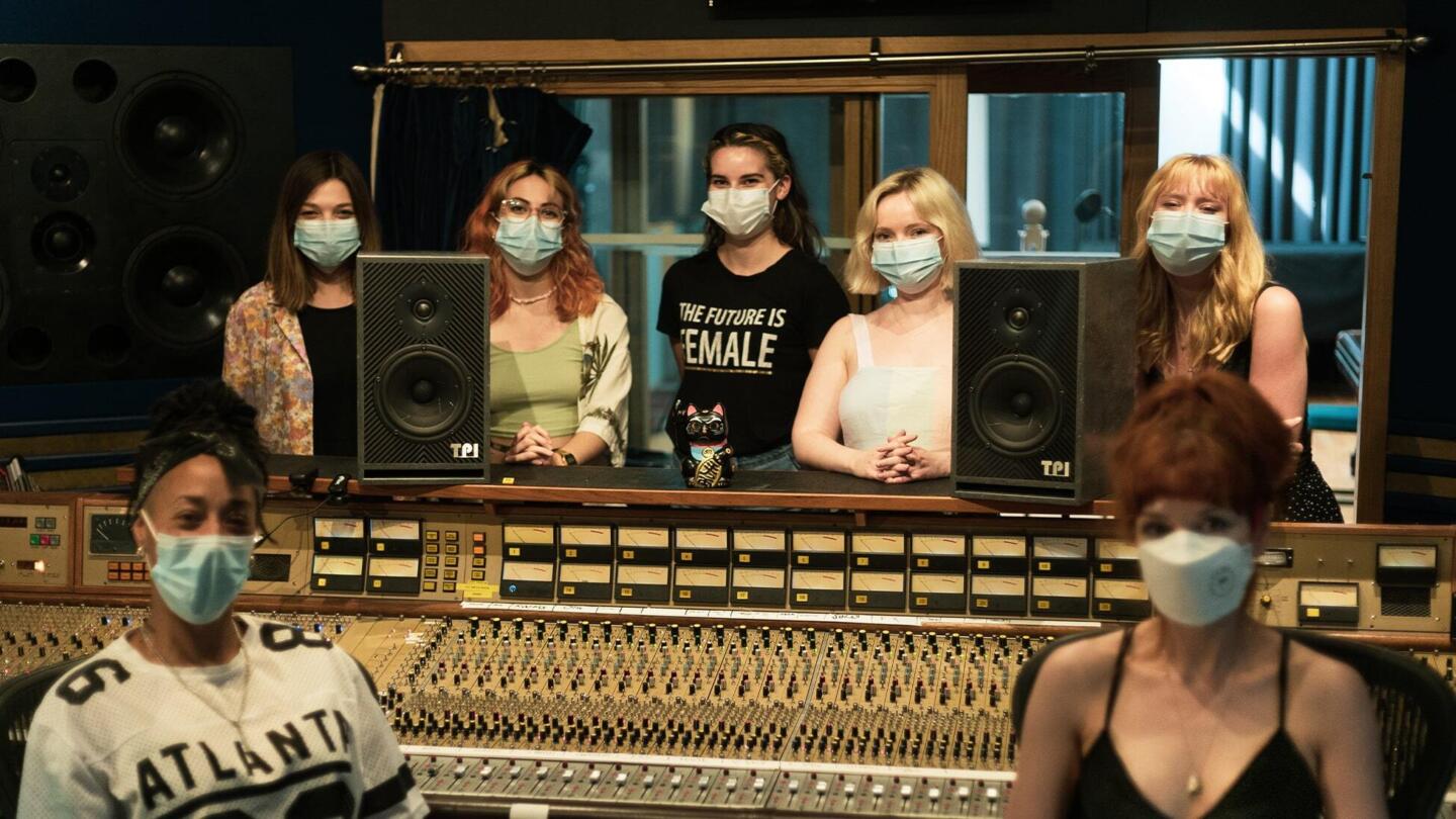 Female musicians in a recording studio