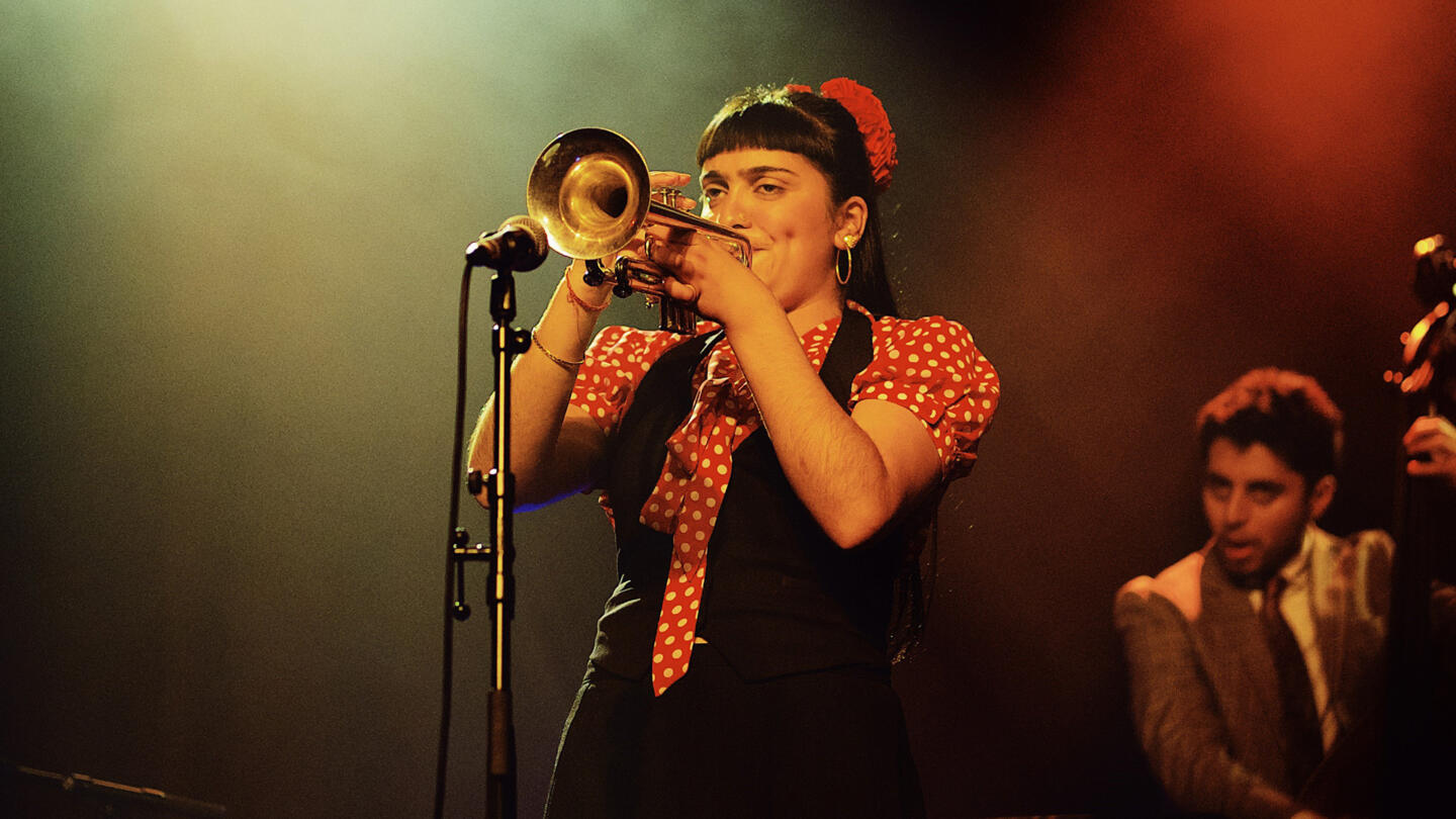 Woman playing saxophone